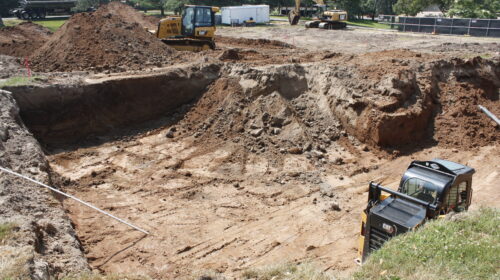 A big hole and mounds of dirt
